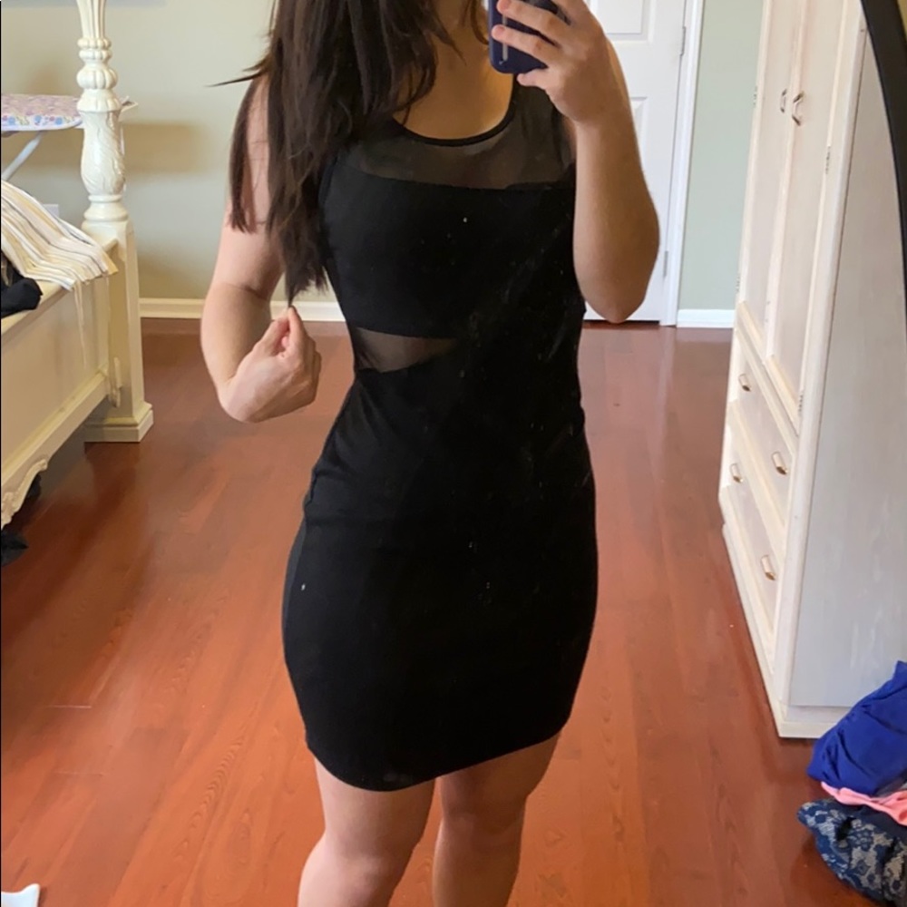 Tight, black dress
